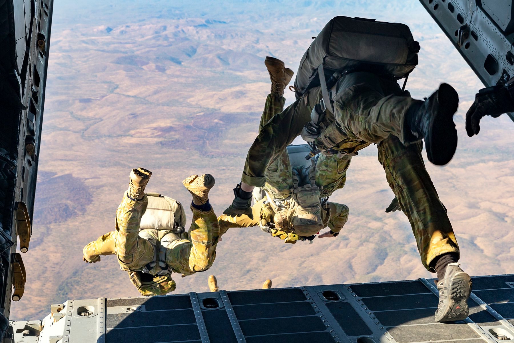 Operators exiting a military aircraft in freefall