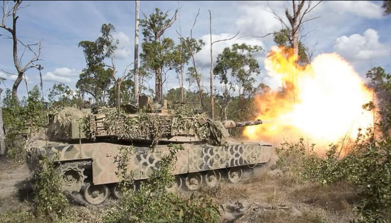 Main battle tank firing main gun